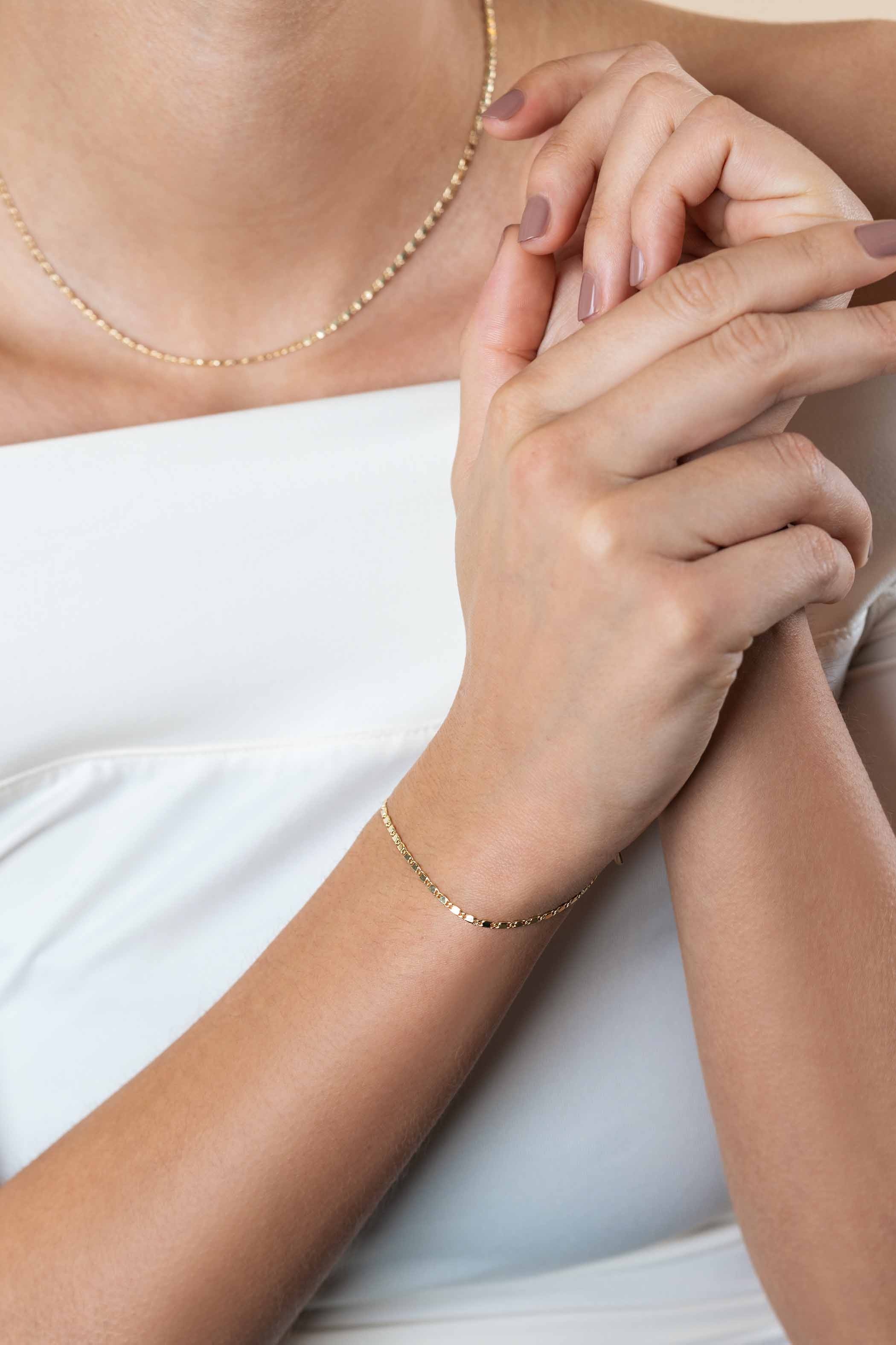 ZINZI Gold 14 karaat gouden massieve armband met glanzende fantasie plaatjes 1,7mm breed 17-19cm ZGA497
