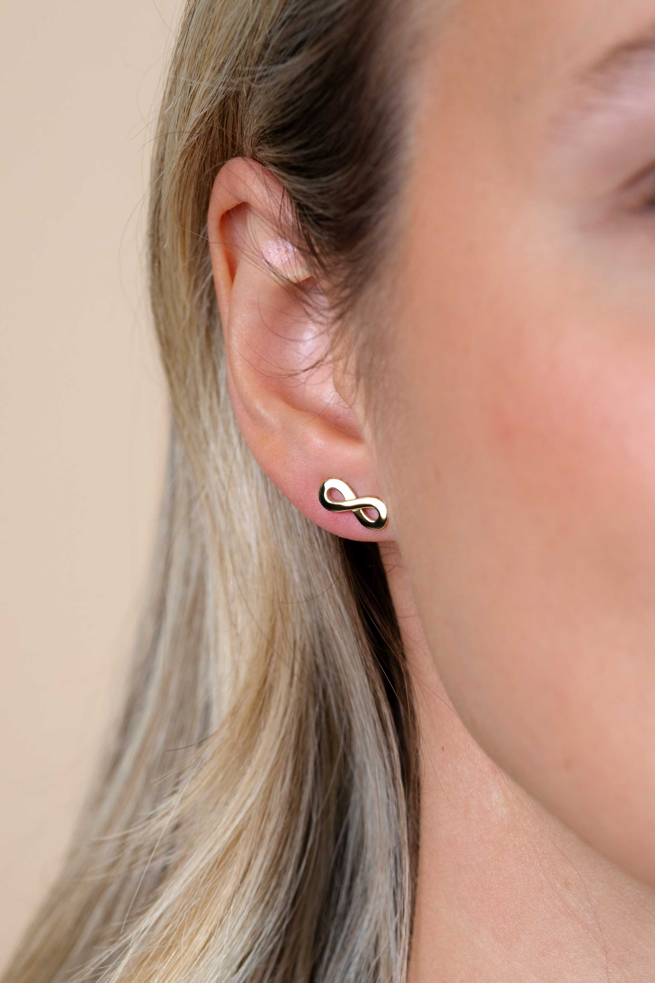 ZINZI zilveren geelgoudvergulde oorknoppen infinity ZIO1065G