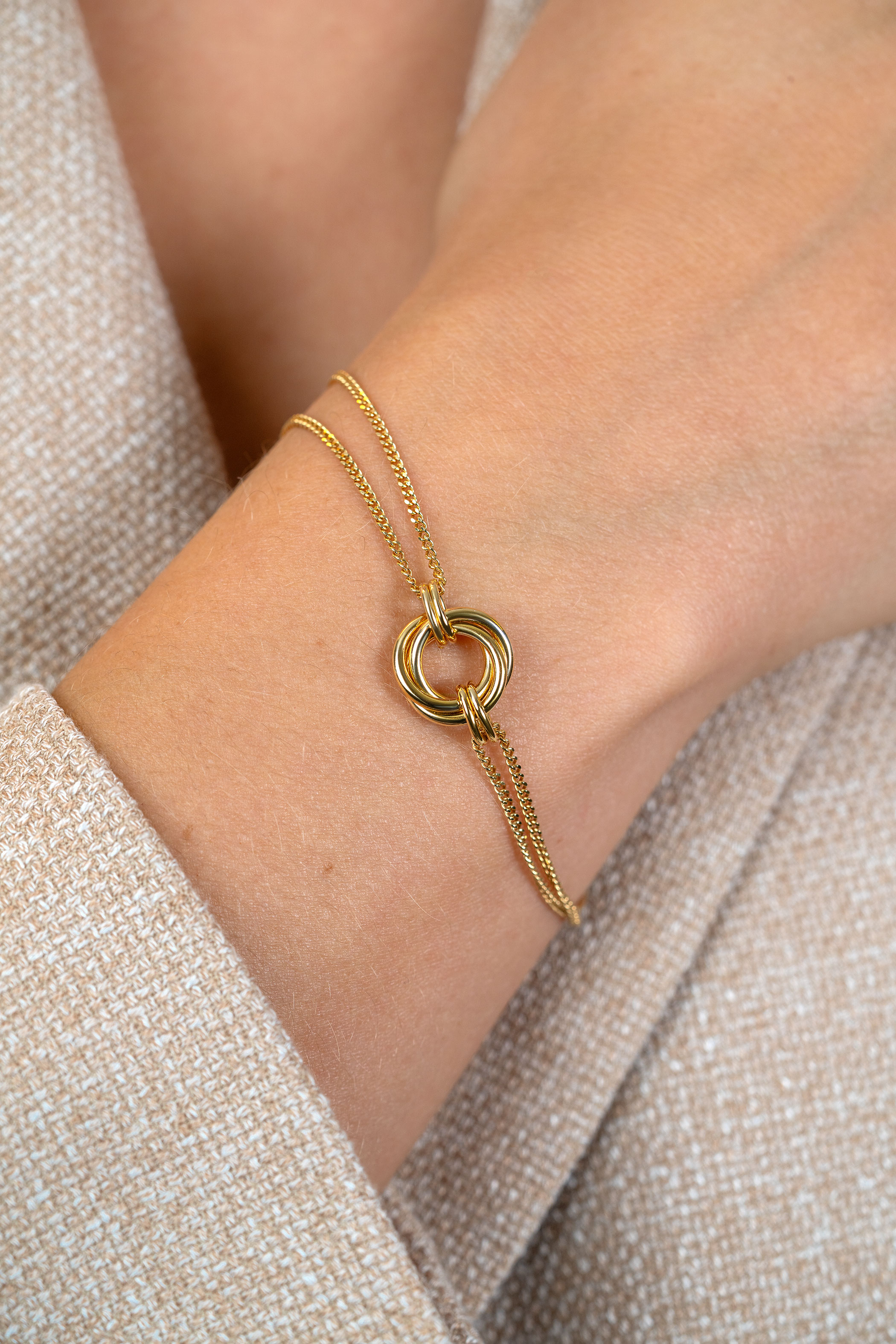 ZINZI gold plated zilveren armband met dubbele gourmet schakel en drie verbonden ringen ZIA2797
