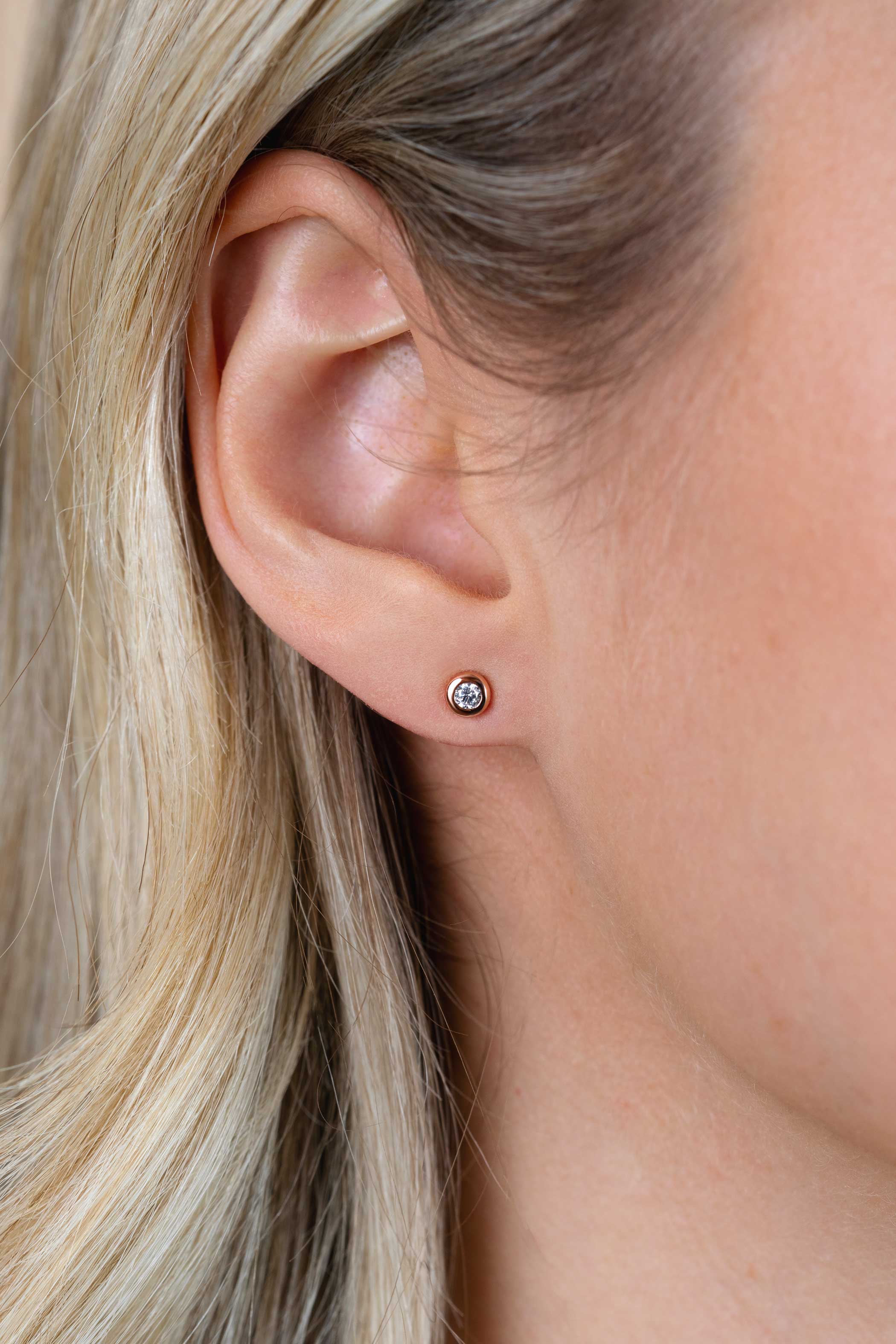 Zinzi zilveren oorknoppen 14K rosé verguld rond 4mm wit ZIO1177R
