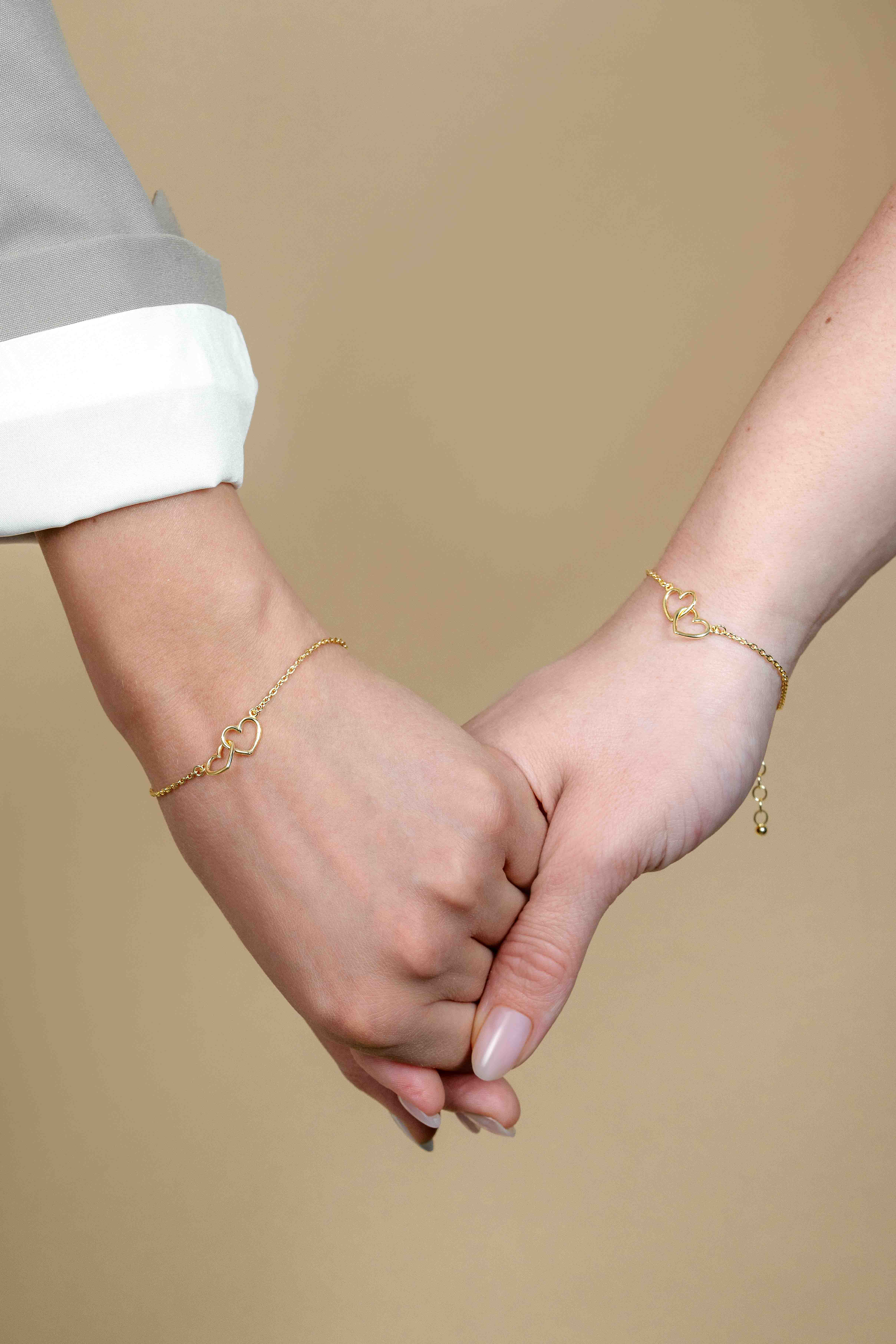 ZINZI set van 2 gold-plated zilveren armbanden met 2 verbonden hartjes 17,5-19,5cm ZIA2513G-SET