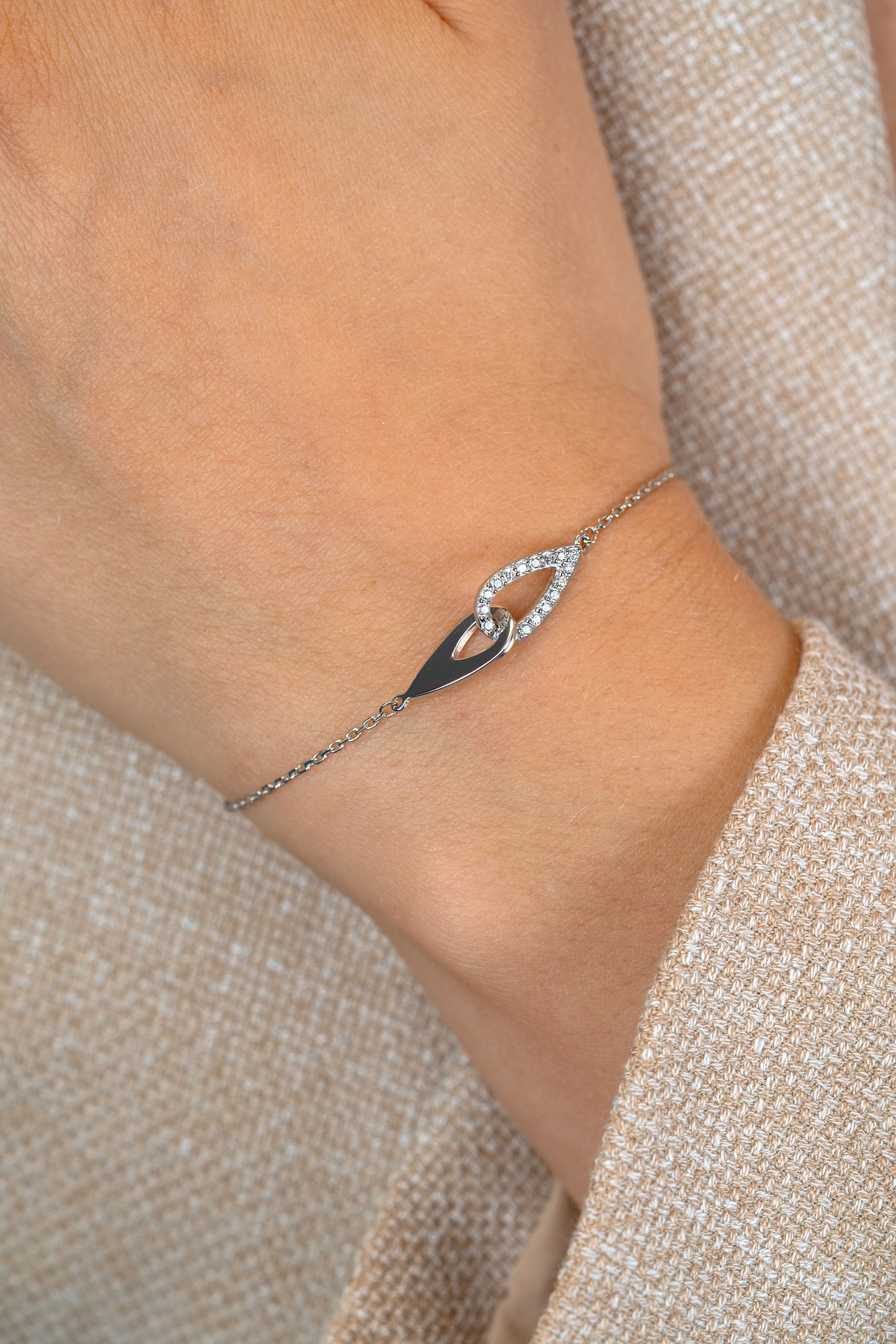 ZINZI zilveren schakelarmband met twee in elkaar gevlochten druppelvormen ZIA2768