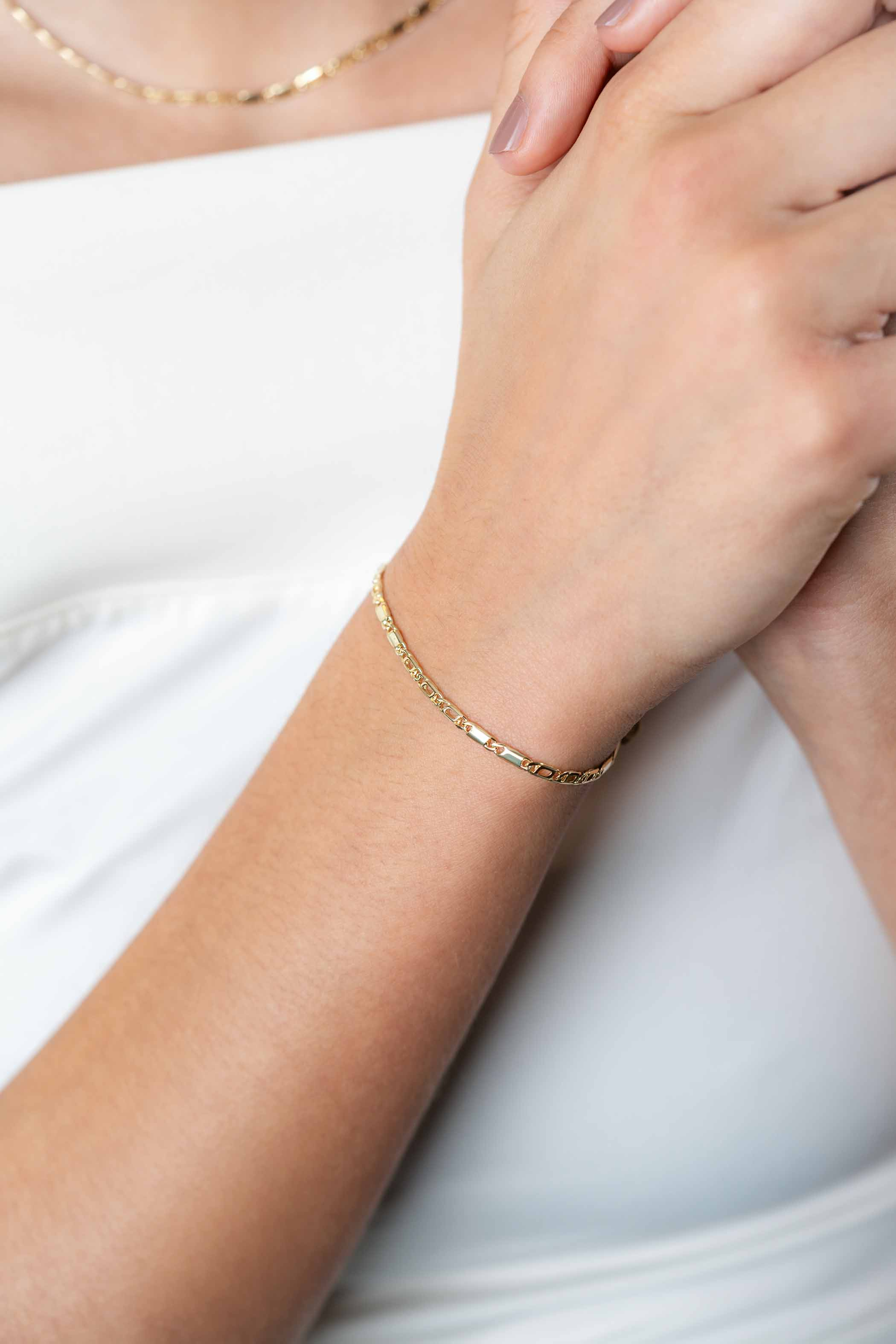 ZINZI Gold 14 karaat gouden massieve armband met valkenoog schakels en glimmende plaatjes 2,6mm breed 17-19cm ZGA499
