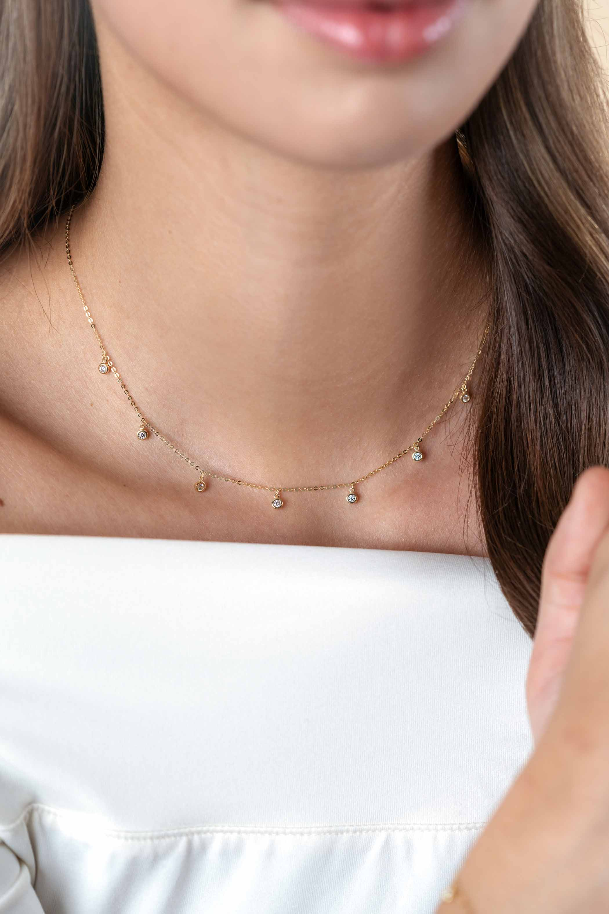 ZINZI Gold 14 krt gouden anker ketting met zeven ronde hangertjes, bezet met witte zirconia's 40-43cm ZGC451
