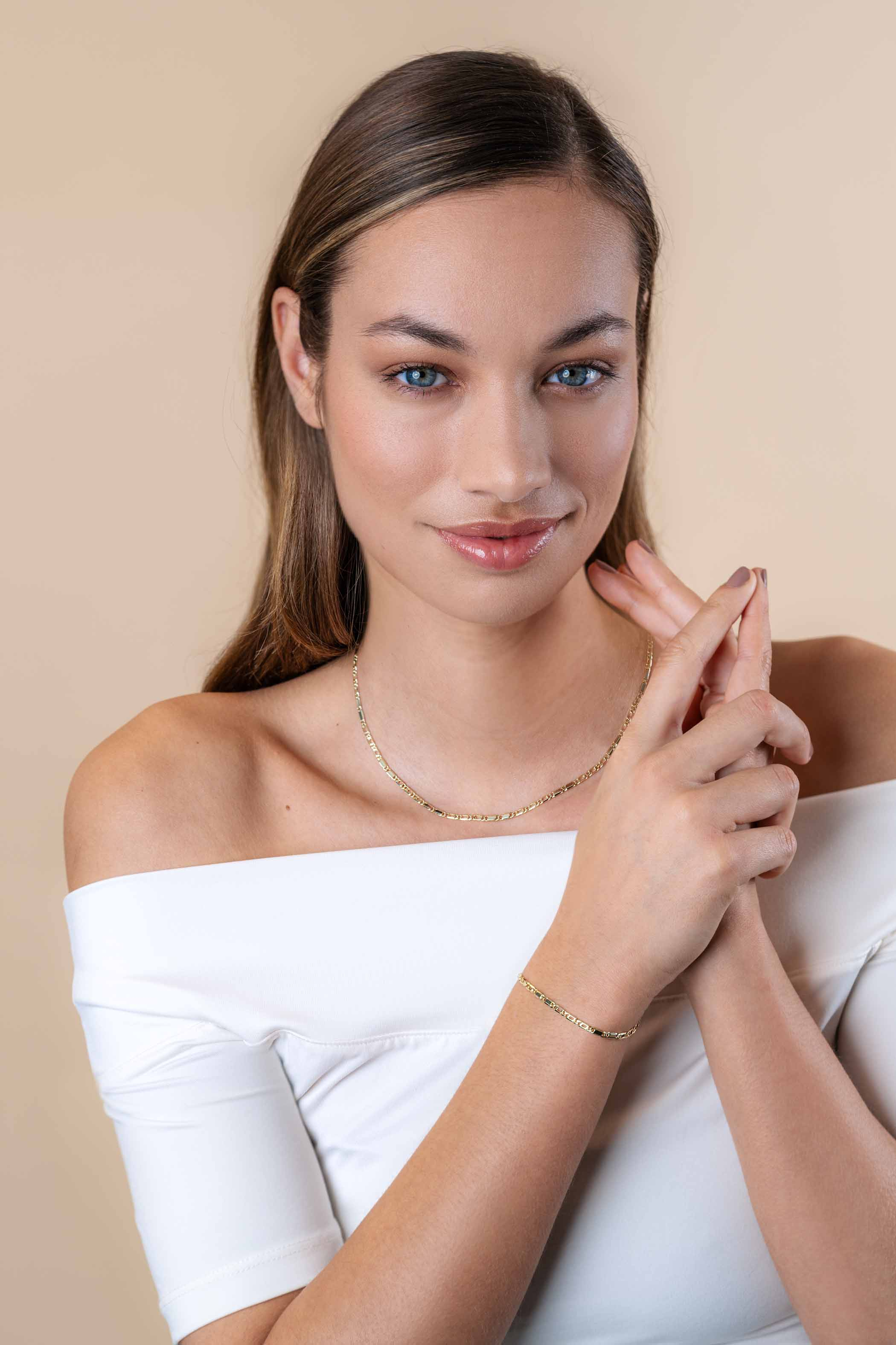 ZINZI Gold 14 karaat gouden massieve armband met valkenoog schakels en glimmende plaatjes 2,6mm breed 17-19cm ZGA499
