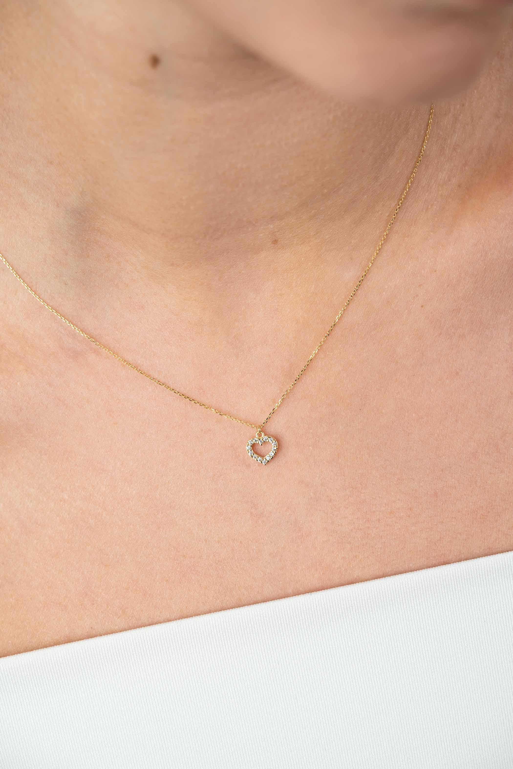 ZINZI Gold 14 krt gouden anker ketting met sierlijk open hartje (7mm), bezet met witte zirconia's 40-42,5cm ZGC450