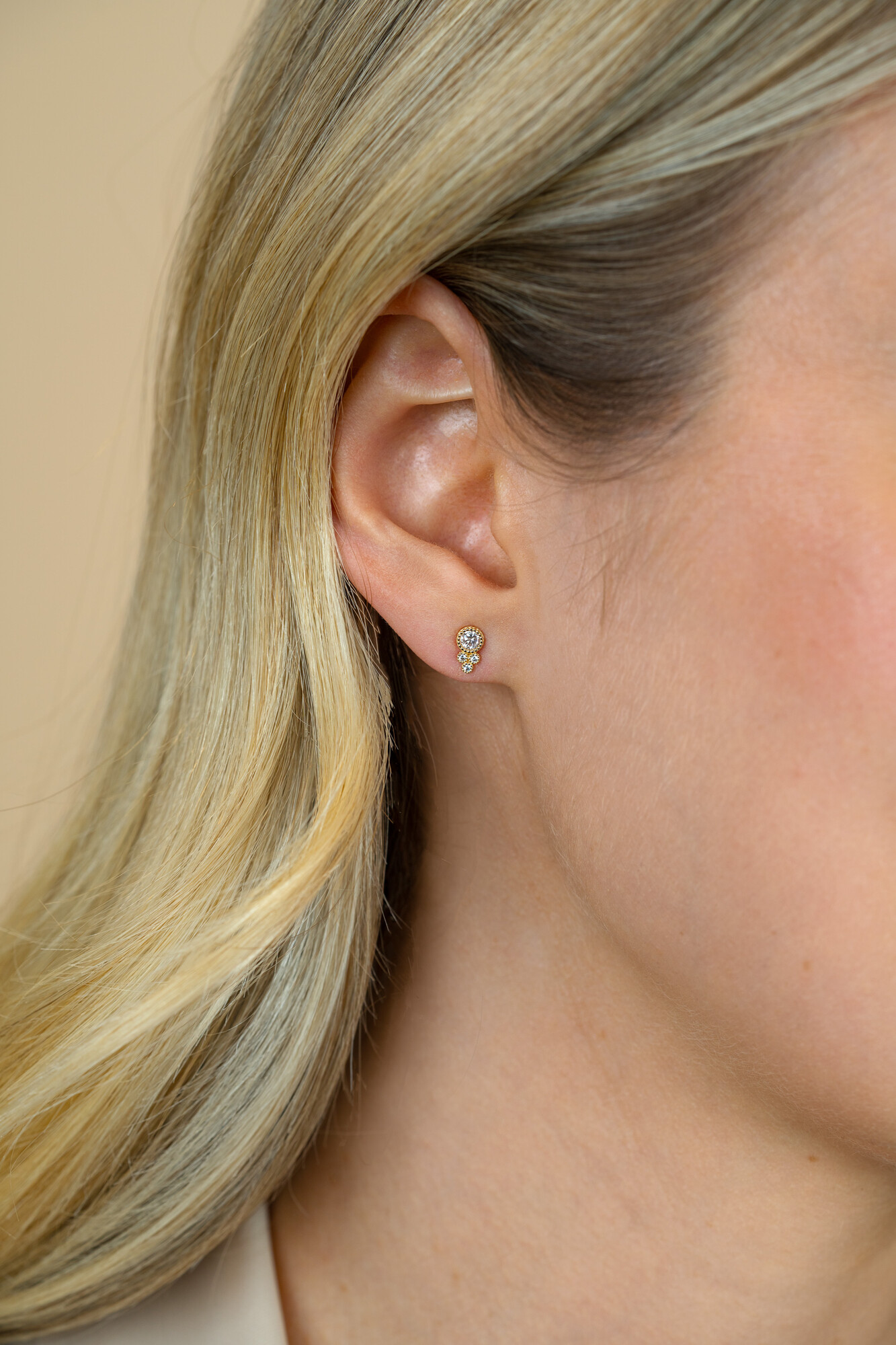 7mm ZINZI Gold 14 krt gouden fantasie oorstekers, bezet met witte zirkonia's ZGO545