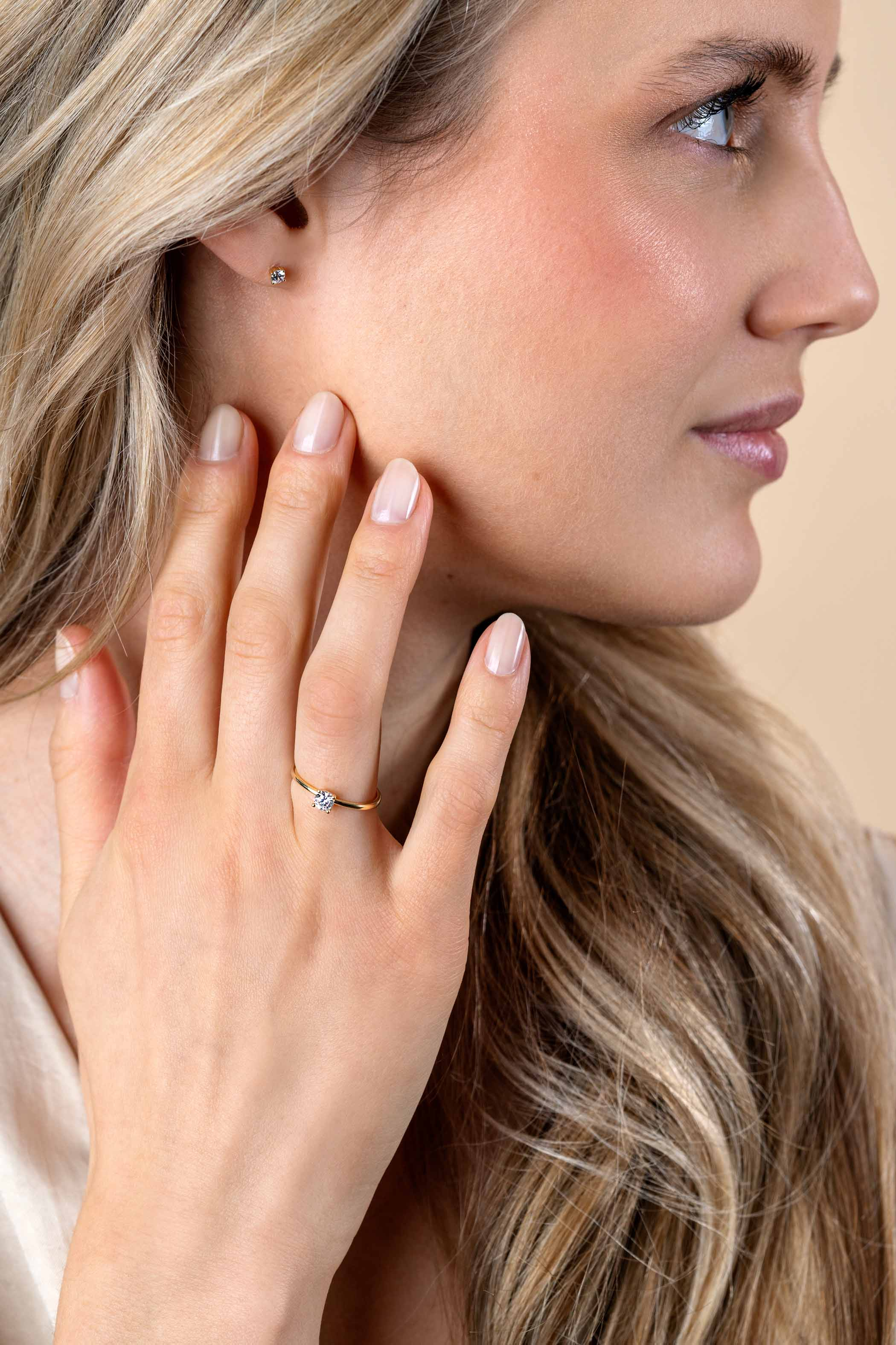 ZINZI Gold 14 krt gouden ring bezet met een ronde witte zirconia in vierpootszetting (4mm) ZGR385
C