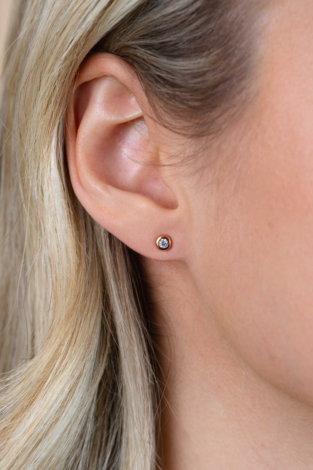 Zinzi zilveren oorknoppen 14K rosé verguld rond 4mm wit ZIO1177R
