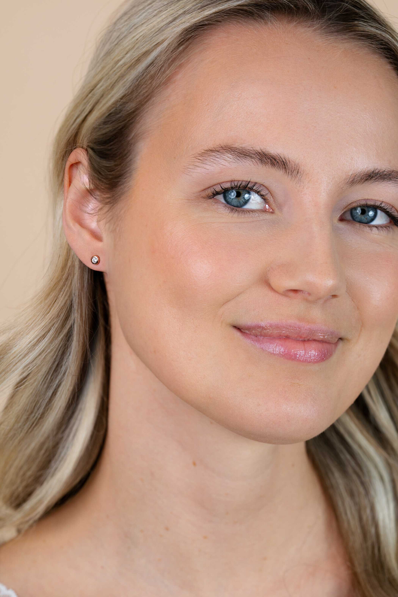 Zinzi zilveren oorknoppen 14K rosé verguld rond 4mm wit ZIO1177R
