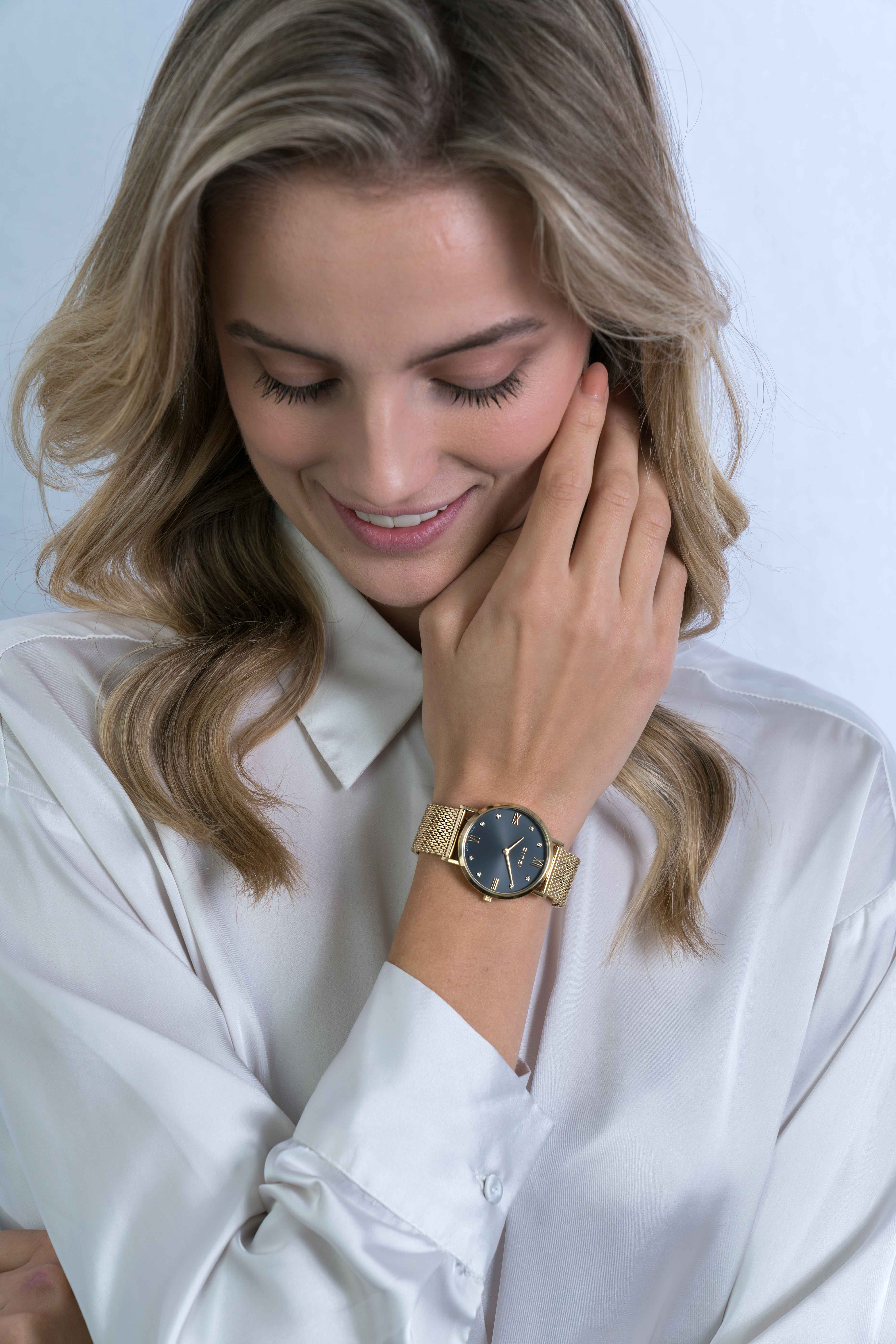 ZINZI Roman horloge zwarte wijzerplaat, witte zirconia's bij uuraanduiding, goudkleurige stalen mesh band 34mm ZIW543M
