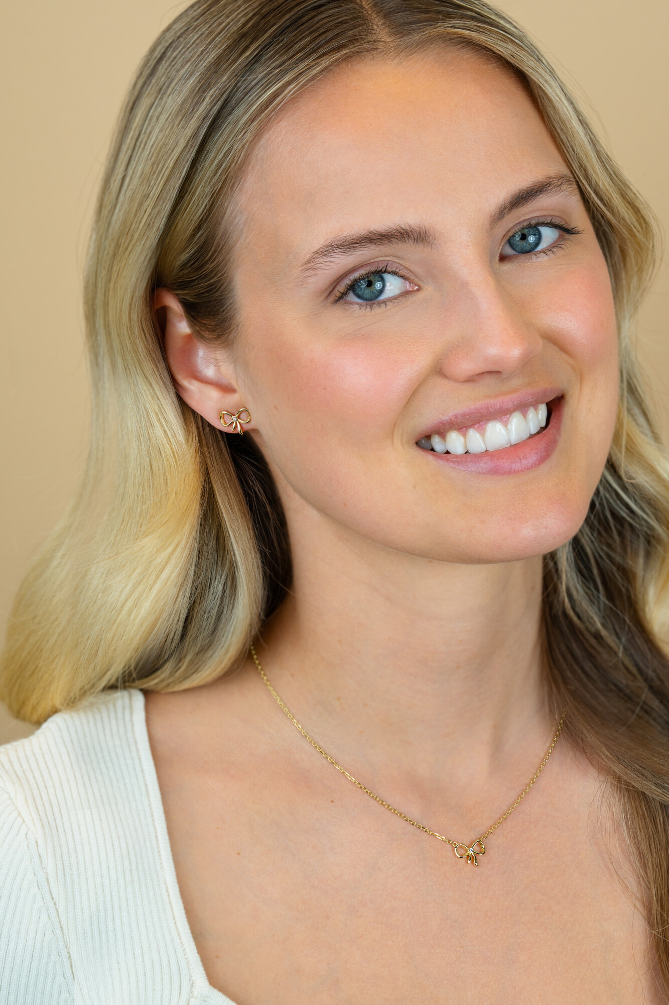 ZINZI gold plated zilveren ketting 42–45cm met sierlijke strik, bezet met witte zirkonia ZIC2724Y