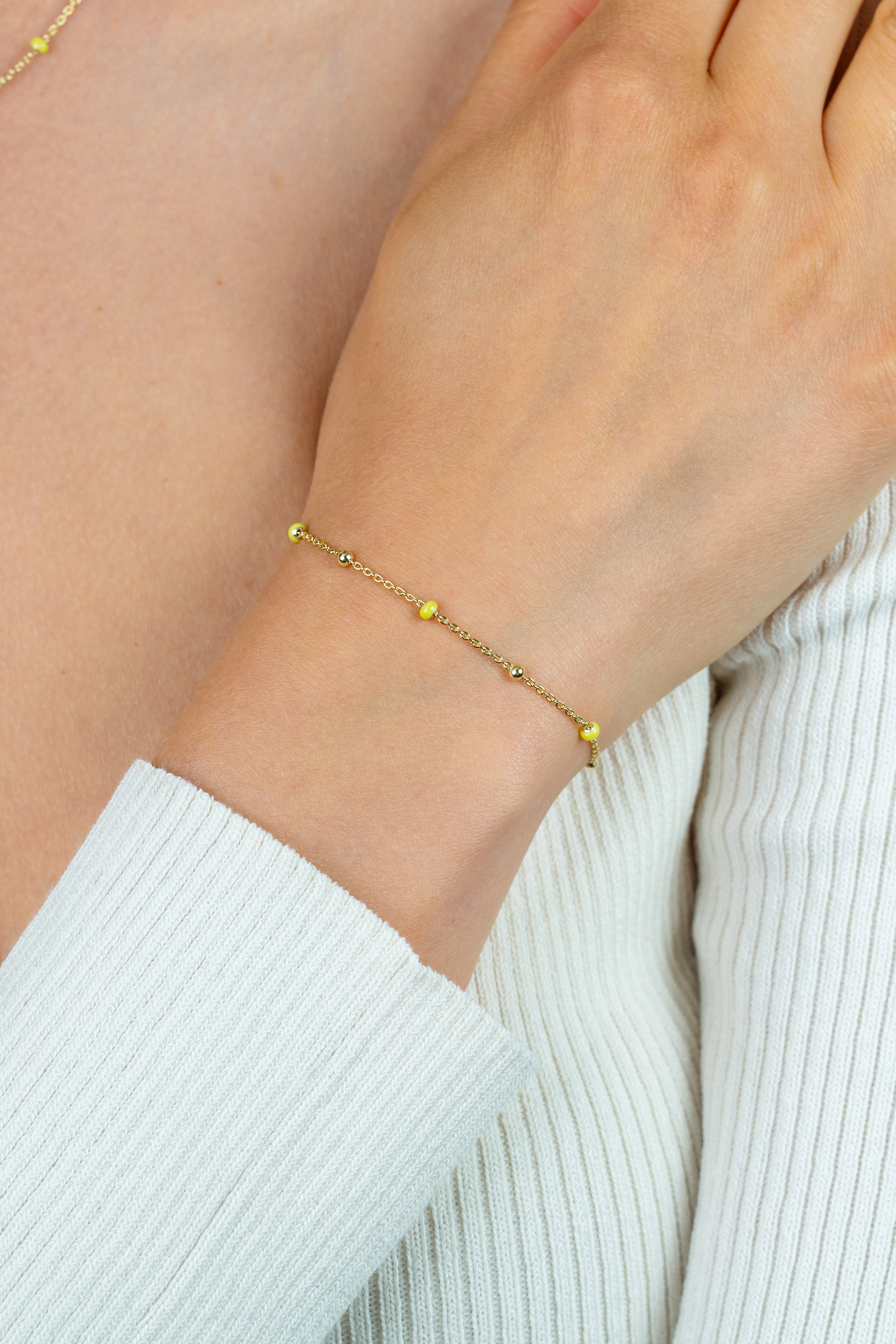 ZINZI gold plated zilveren fantasie armband met 5 geelgroene donuts en glanzende bolletjes 17-19,5cm ZIA2508