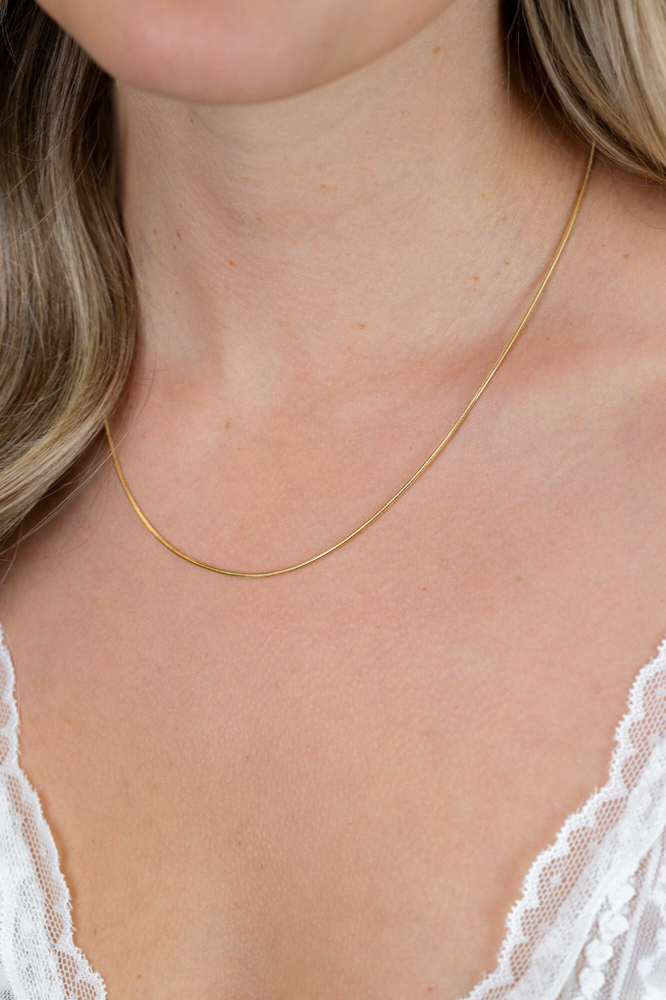 Zinzi zilveren slangen collier geel verguld 1mm breed 45cm ZISL45G