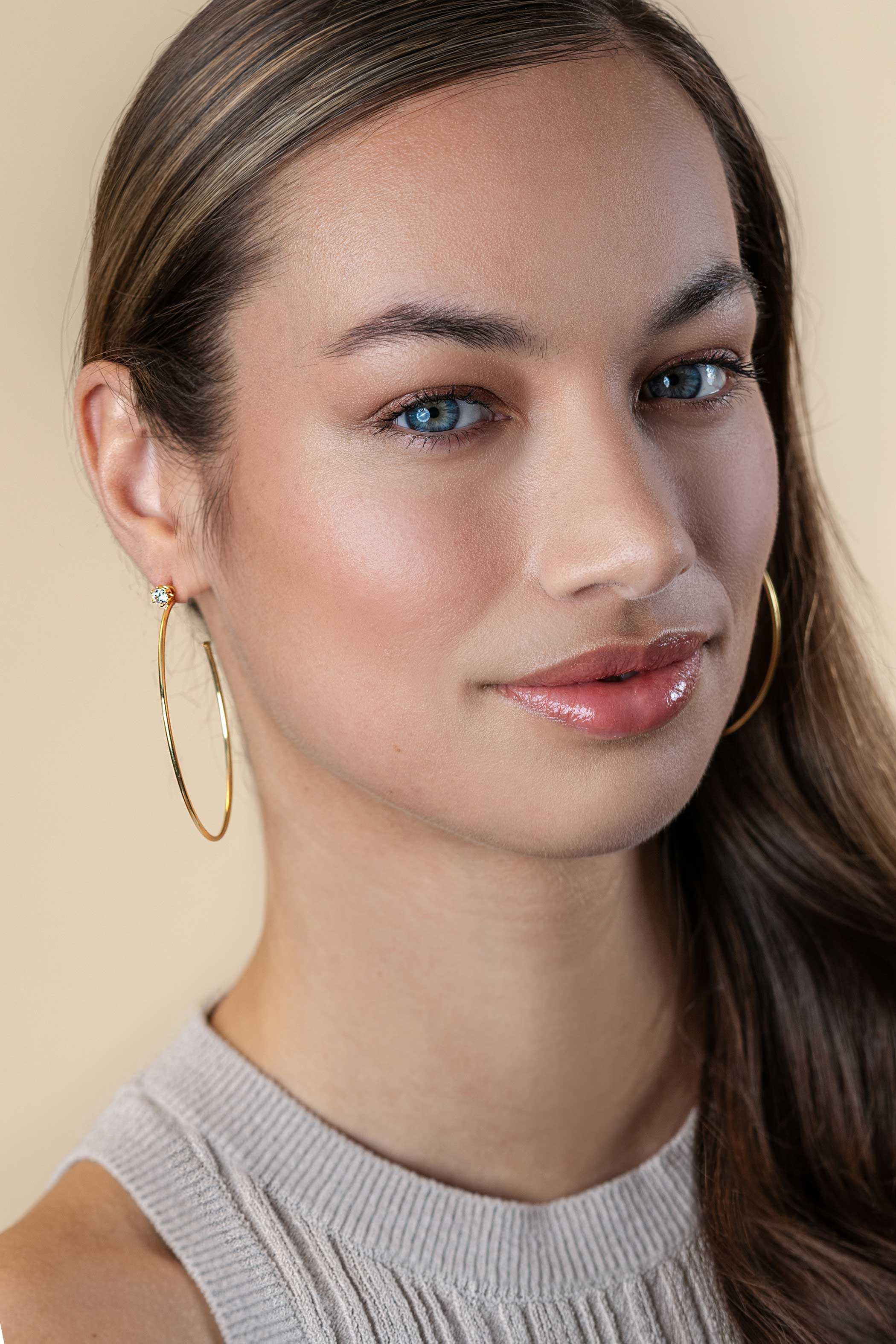 55mm ZINZI gold plated zilveren oorstekers 5mm witte zirconia met halve oorringen 55mm en 1,5mm buisdikte ZIO2574Y
