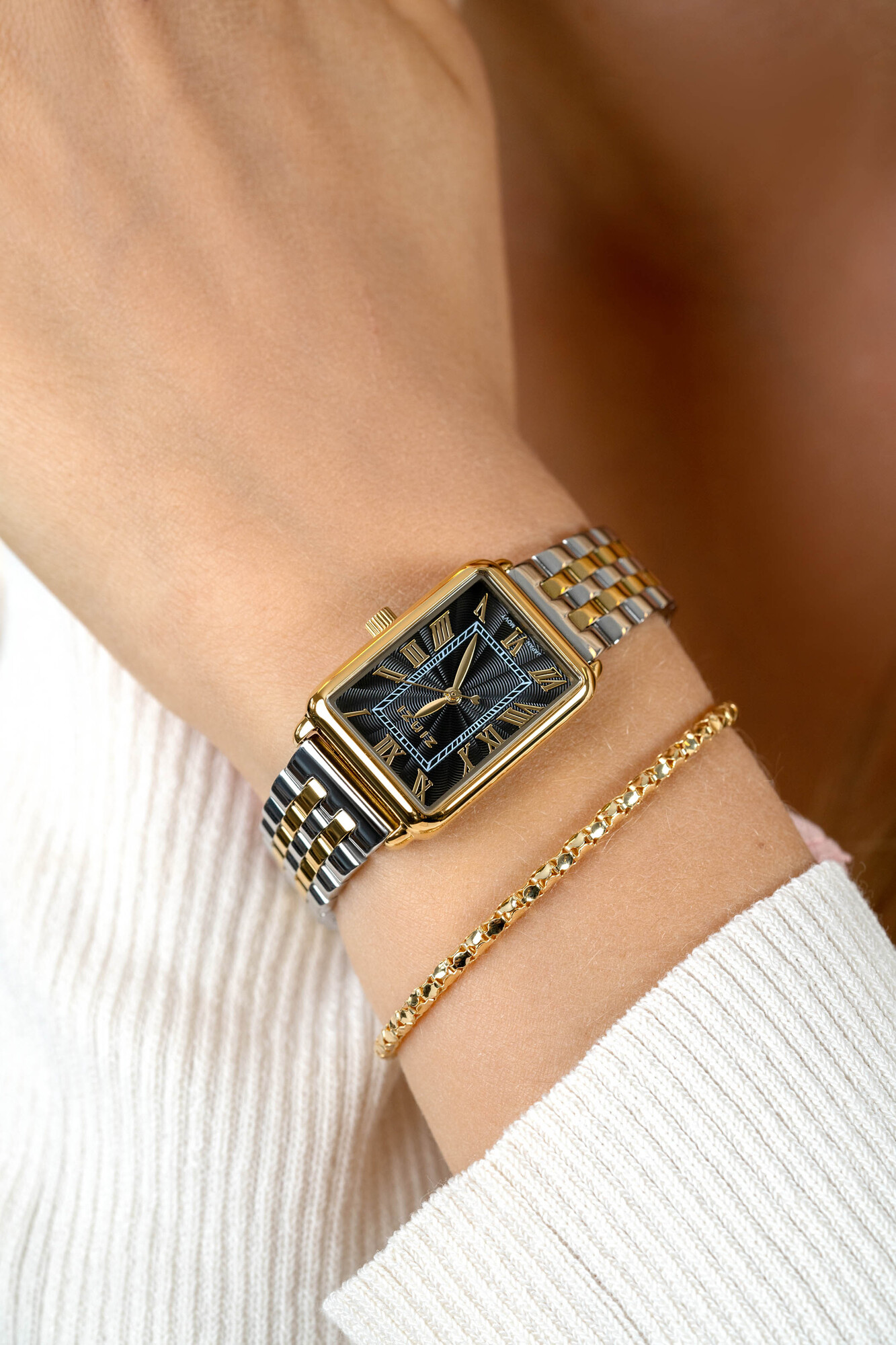 ZINZI Elegance horloge zwarte wijzerplaat en rechthoekige kast stalen bicolor schakelband 28mm extra dun ZIW1943
