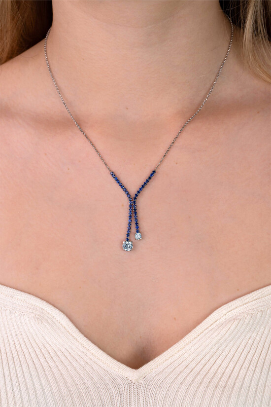 ZINZI zilveren Y-collier 45cm met luxe tennislook en saffierblauwe zirkonia's in rijzetting met twee grotere lichtblauwe zirkonia's ZIC2894B