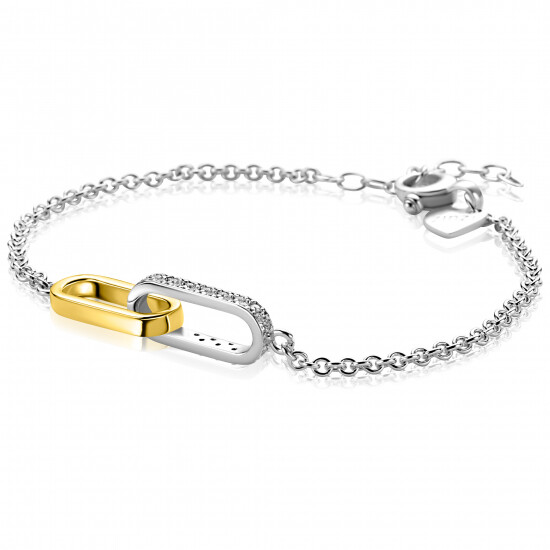 ZINZI zilveren schakelarmband met twee verbonden ovale schakels: ene gold plated, ander bezet met witte zirkonia's ZIA2758