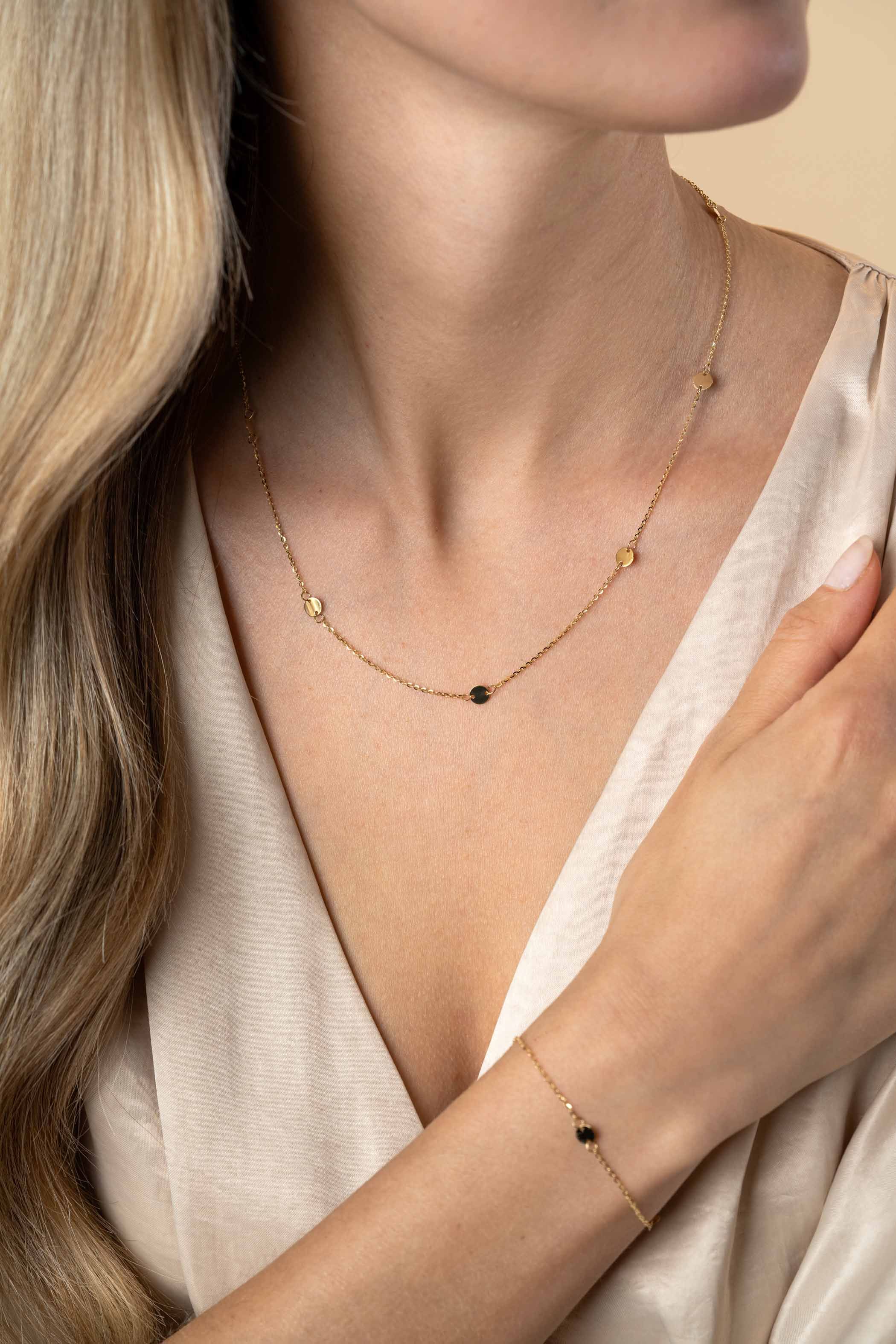 ZINZI Gold 14 krt gouden ketting met subtiele jasseron schakels en zeven ronde gladde plaatjes 5mm breed 42-45cm ZGC444
