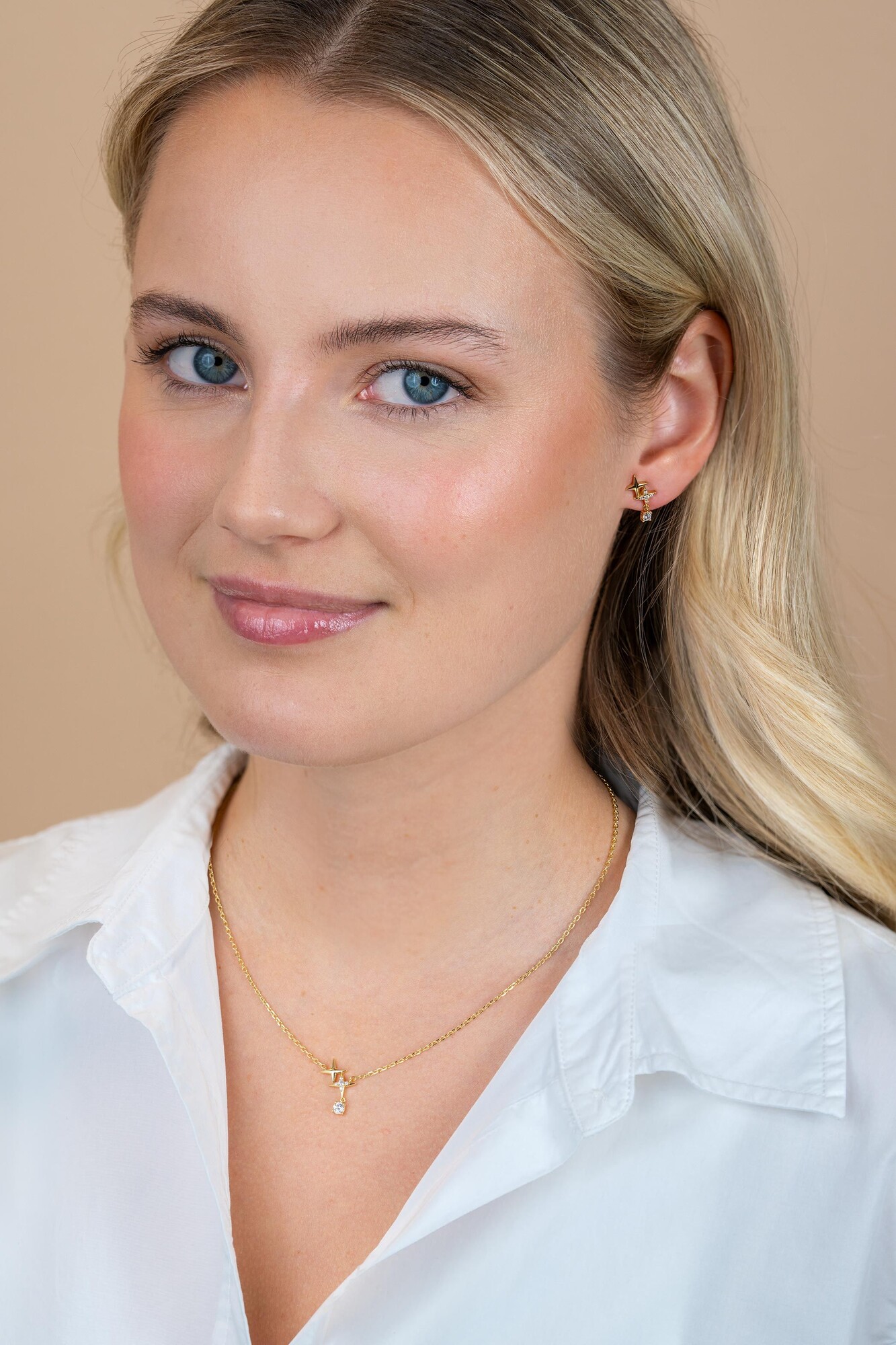 ZINZI goldplated zilveren ketting 45cm 'sterrendans' met twee speelse sterren en bungelende witte zirkonia ZIC2837